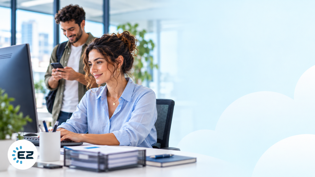 Office manager comparing payroll computer software options at her desk