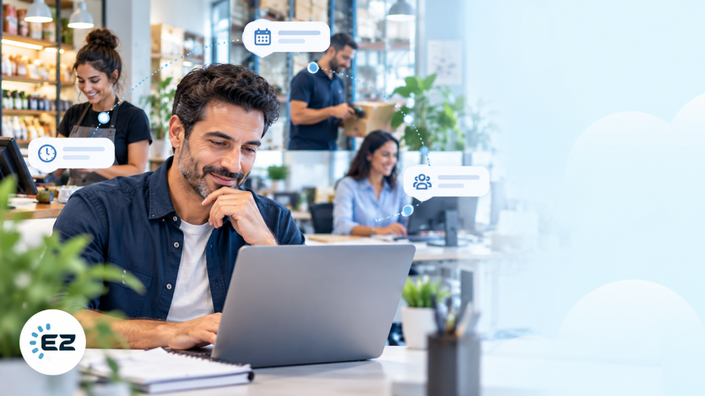 Business owner managing the workplace from one platform on a laptop