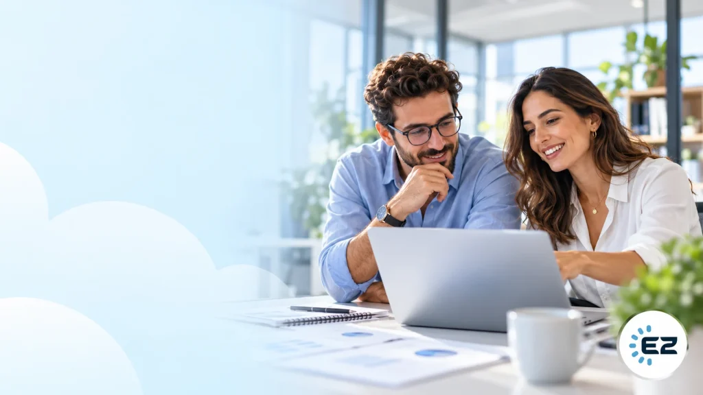 Managers reviewing EZTime features on a laptop